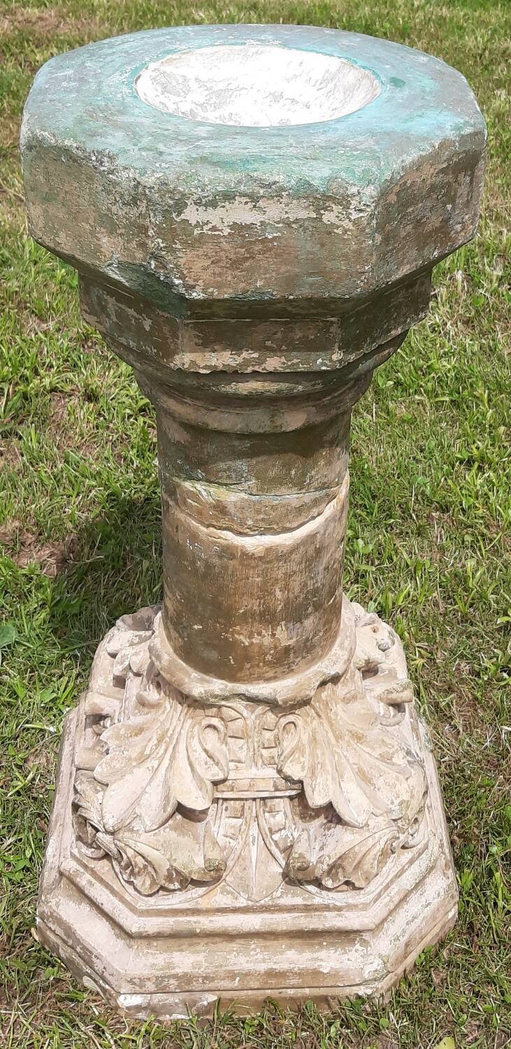 Holy water font on stone column (17th century)
