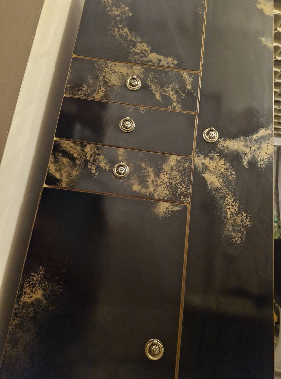 Black and gold lacquered Sanibloc furniture in the style of Maison Jansen, 1970