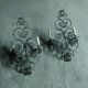 Two large wrought iron wall lights