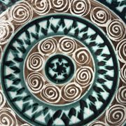 Picault, polychrome earthenware plate with geometric decoration from the 20th century.