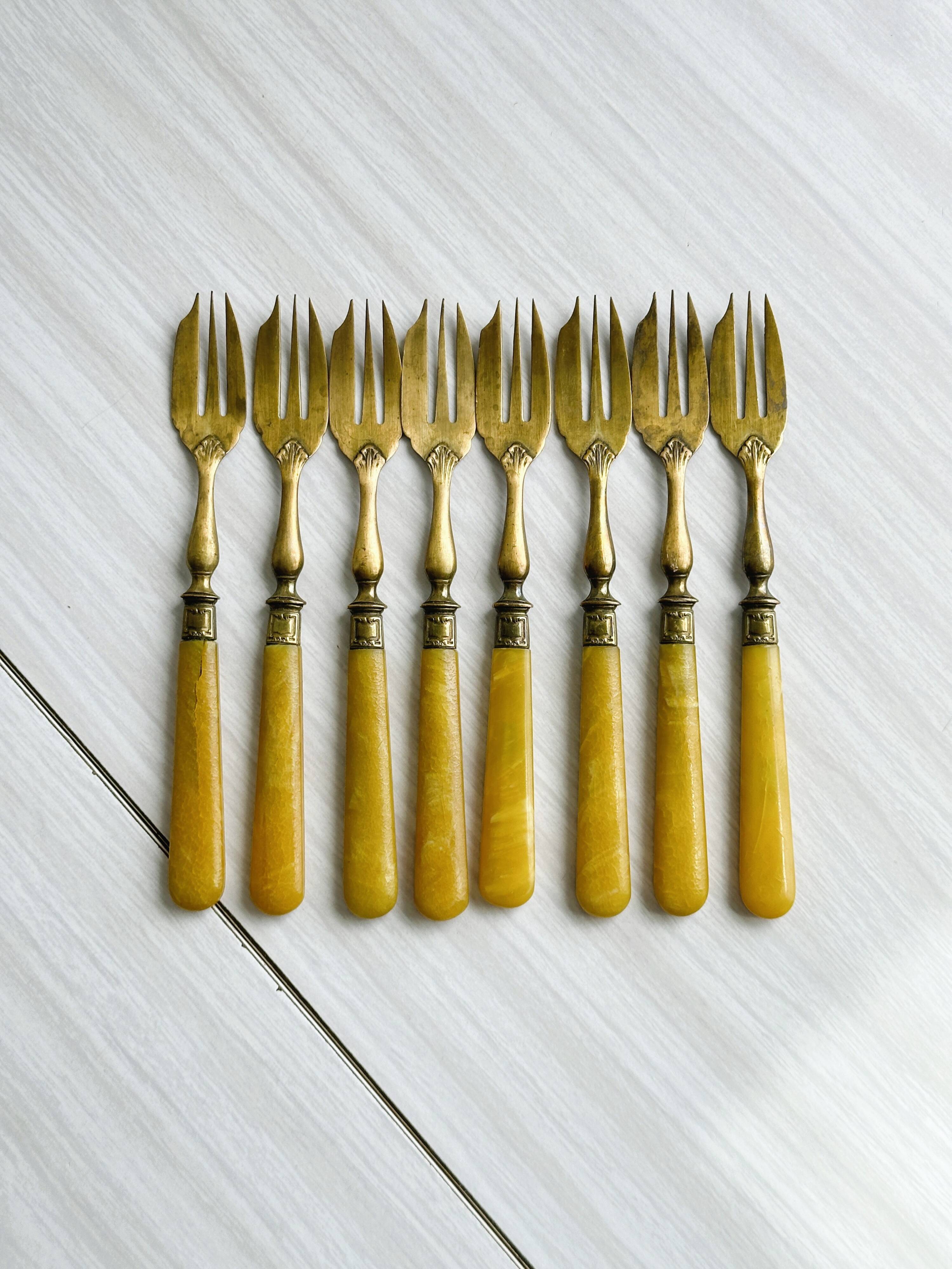 Set of 8 vintage gold metal dessert forks