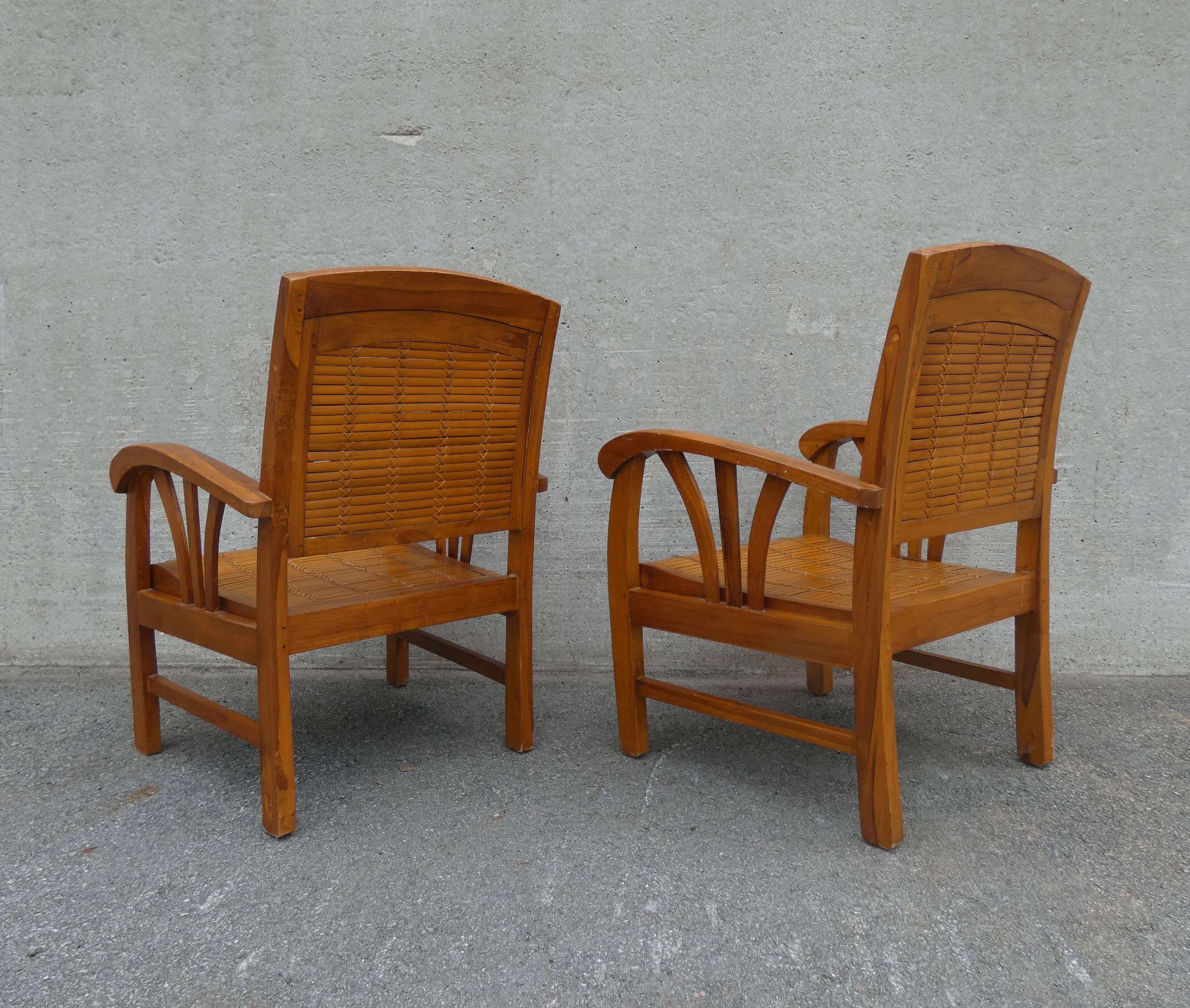 2 colonial bamboo and teak armchairs