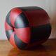 Vintage round pouf in red and black Skai