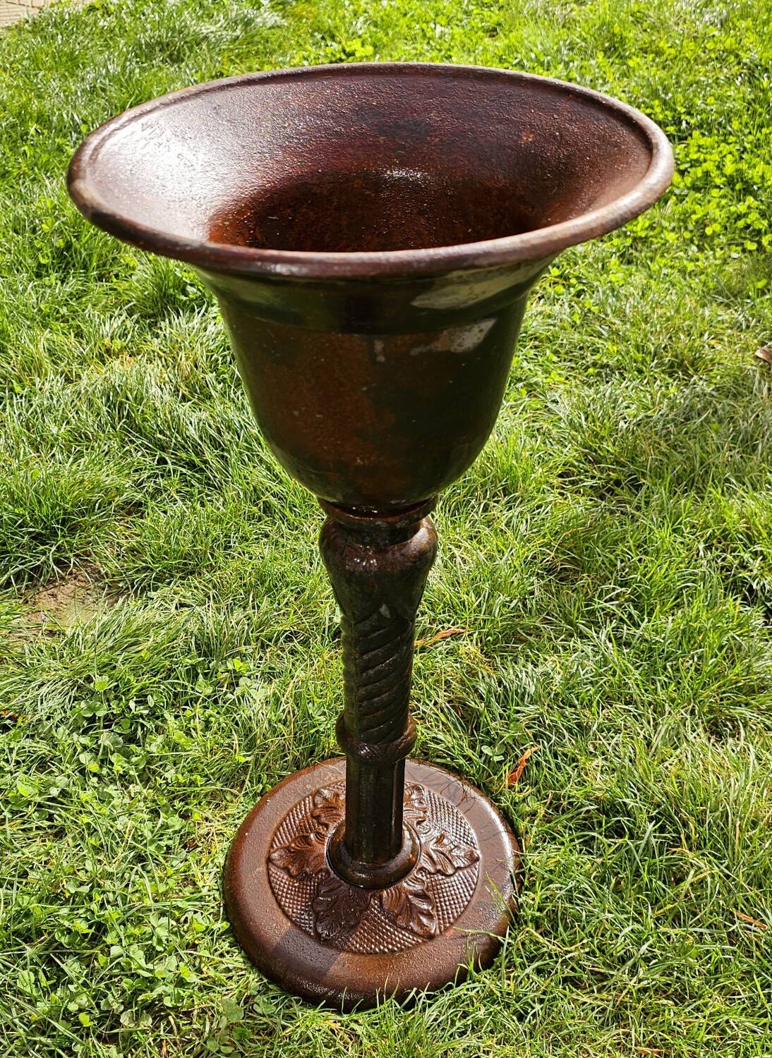 Cast iron vase on foot