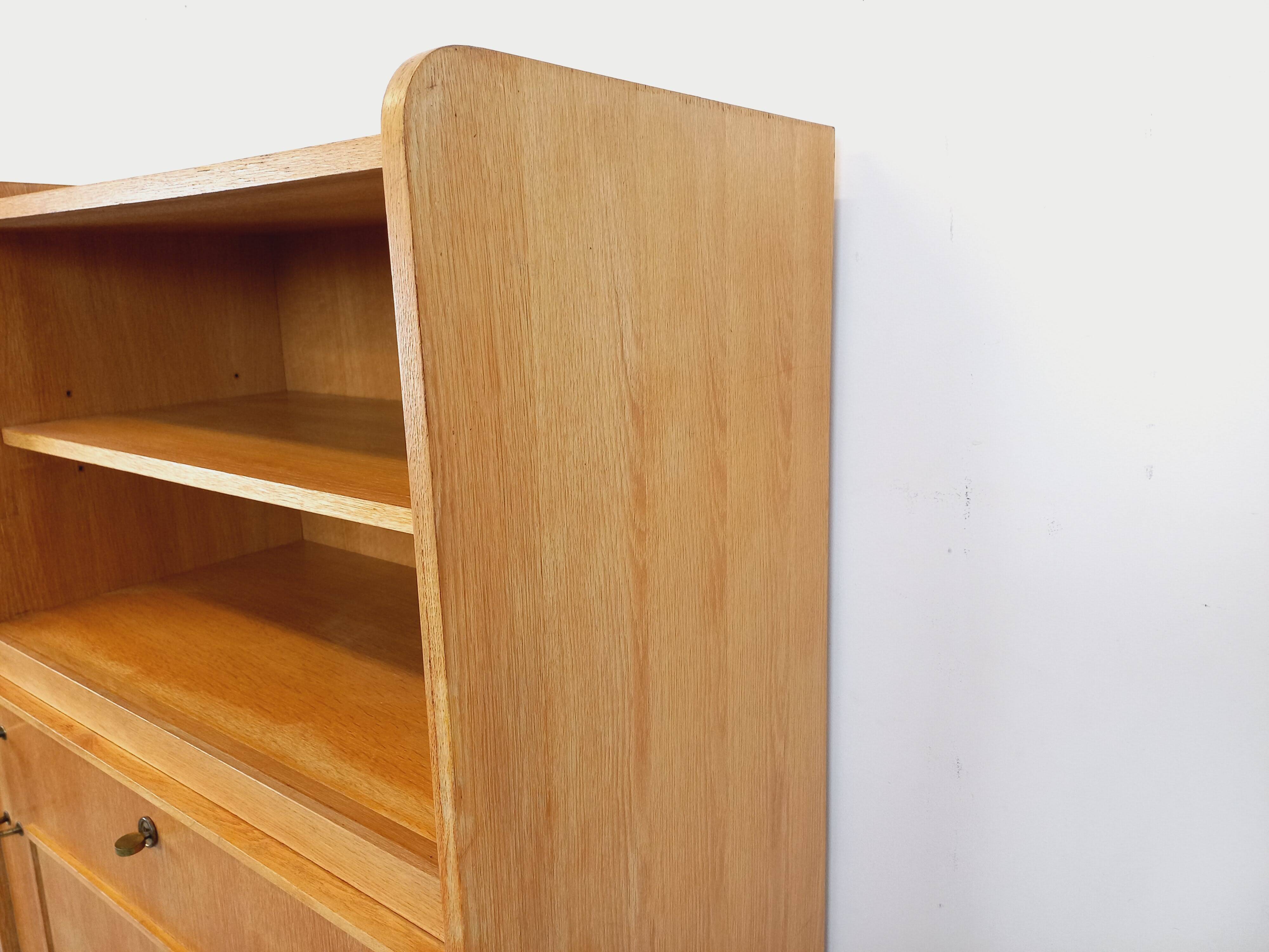Vintage bookshelf with oak side table.