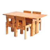 Vintage table and chairs designed by Silvio Coppola for Fratelli Montina.