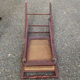 4 cane-seated solid wood folding chairs to be repaired.