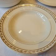 Table service in opaque porcelain with gold leaf.