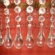 circular chandelier with a brass frame and crystal drops