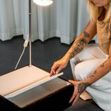 Set of 2 side tables with integrated lamp.