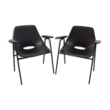 Pair of armchairs, Tonneau model, in black skai by Pierre Guariche, 60s