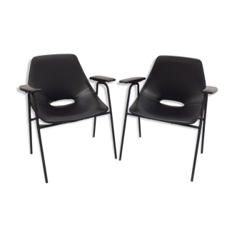 Pair of armchairs, Tonneau model, in black skai by Pierre Guariche, 60s