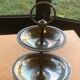 Double cup display in vintage silver metal