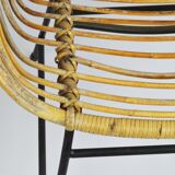 A pair of wicker chairs, 1970s