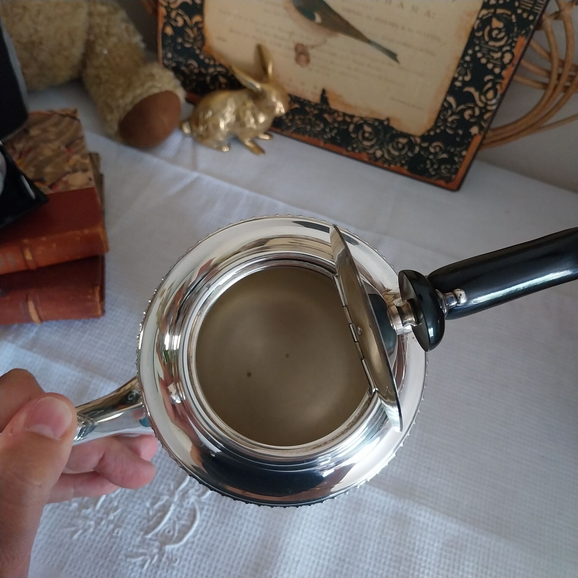 Old English coffee pot in silver-plated metal and Bakelite.