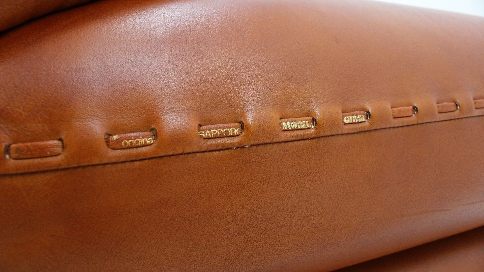 Sapporo cognac leather armchairs by Girgi 1970s