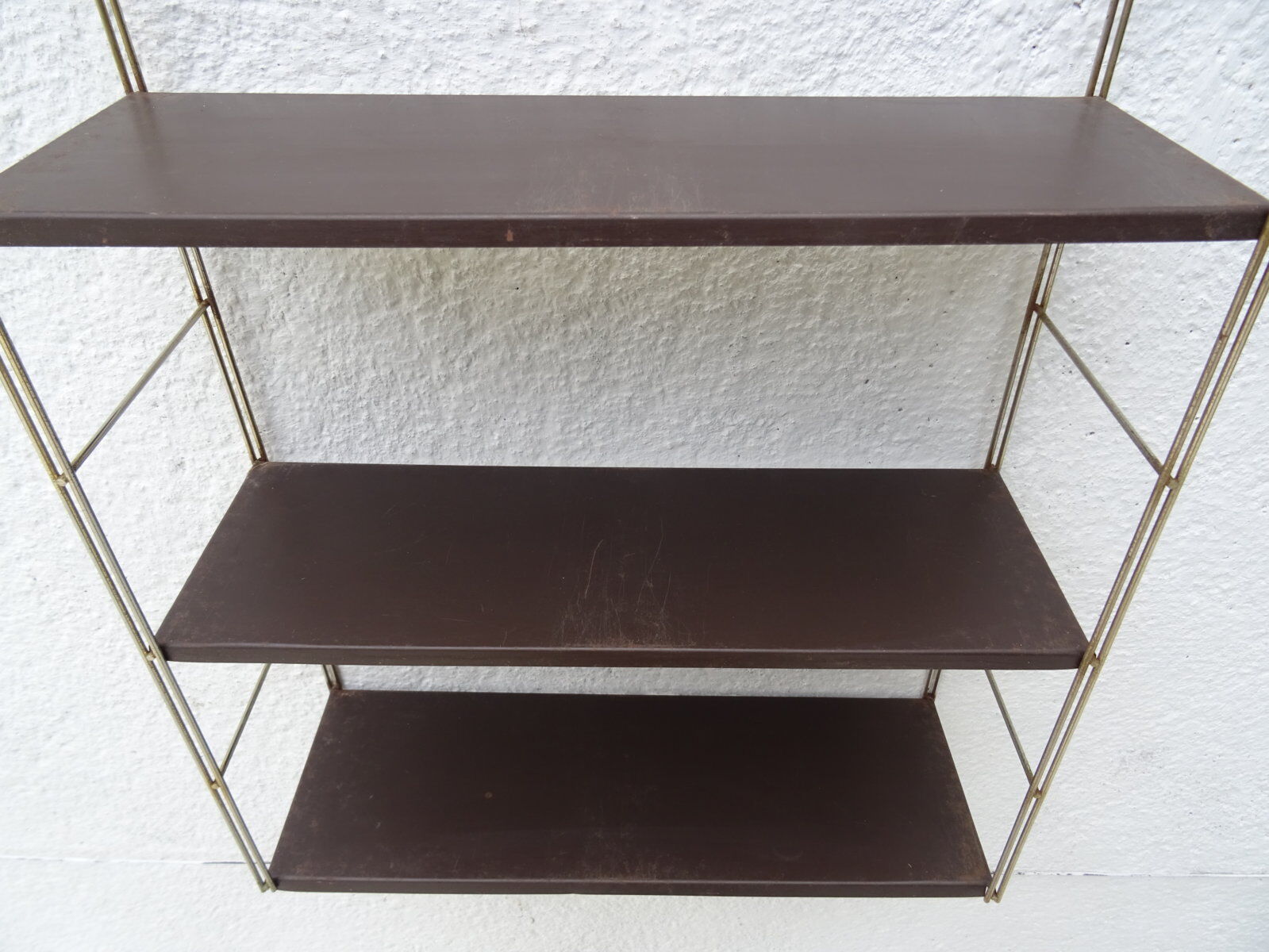 Metal string modular wall shelf