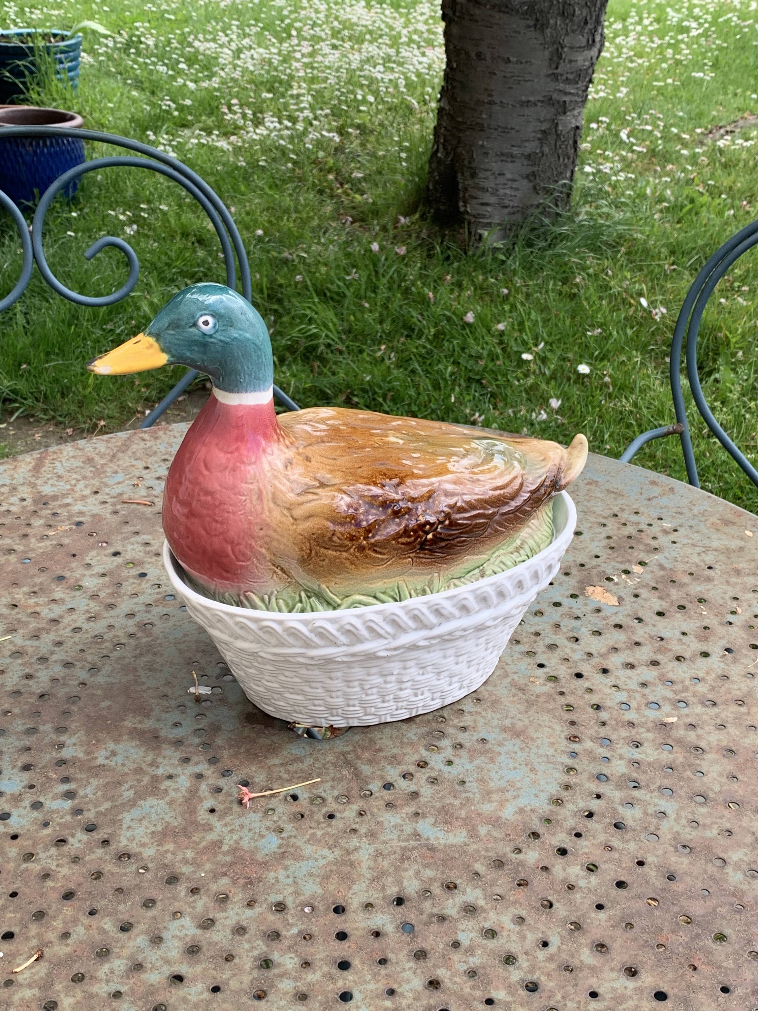 Charming Duck, slip, enameled ceramic terrine, white basket-shaped base and lid