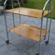 Folding dessert trolley on chrome metal wheels and formica.