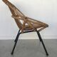 Fauteuil coquille en rotin - piétement tubulaire métallique noir - 1960