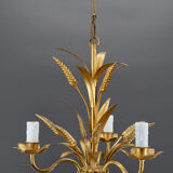 Golden suspension on ears of wheat, circa 1960