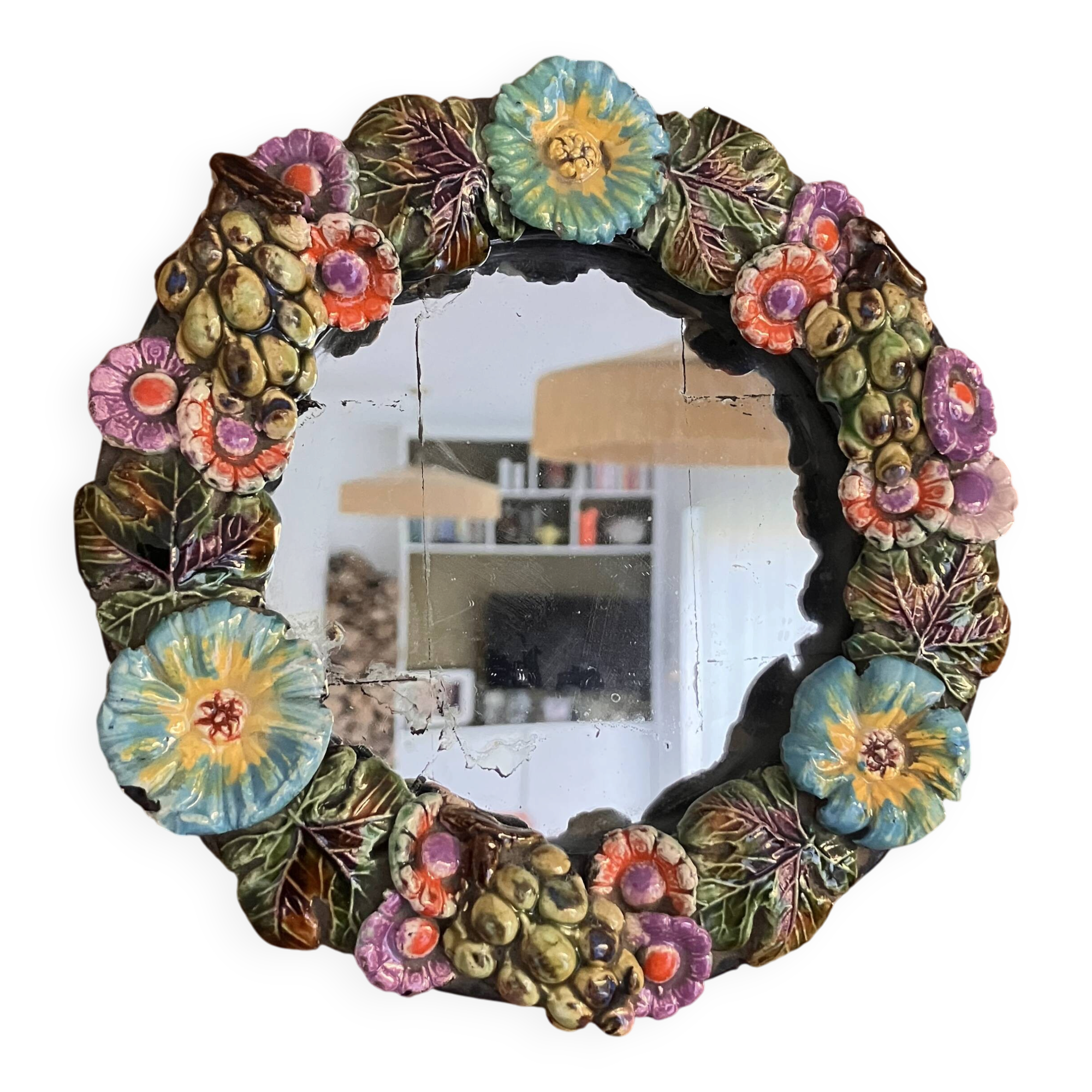Round wall mirror in ceramic with slip-cast flowers, glazed, from the 60s/70s.