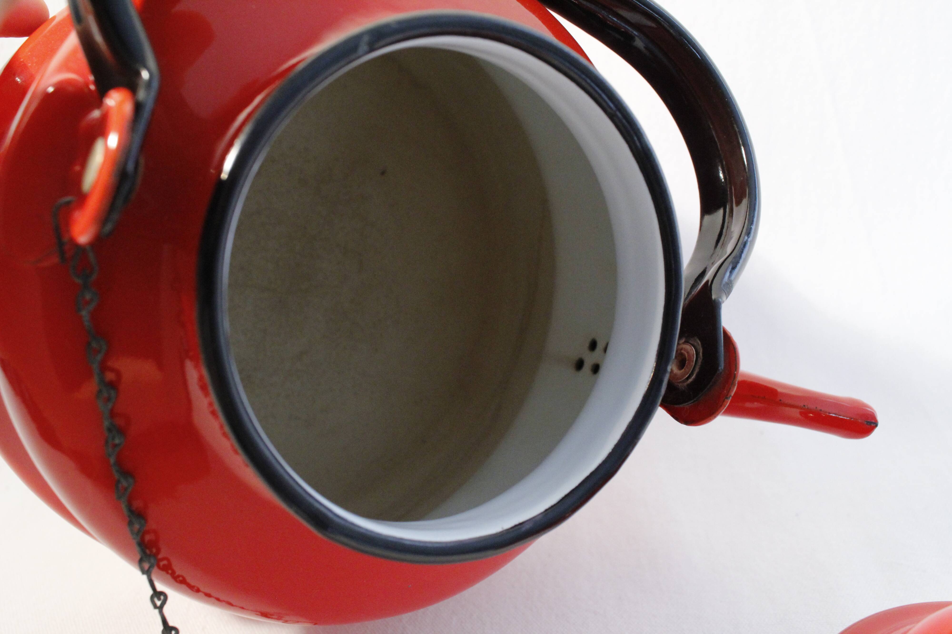 Vintage red enamelled metal kettle