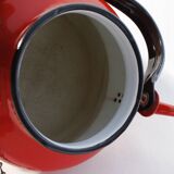Vintage red enamelled metal kettle