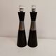 Two table lamps made of dark-stained wood with silver detail in the middle.
