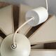 Suspension fleur petales beiges et dorees vintage