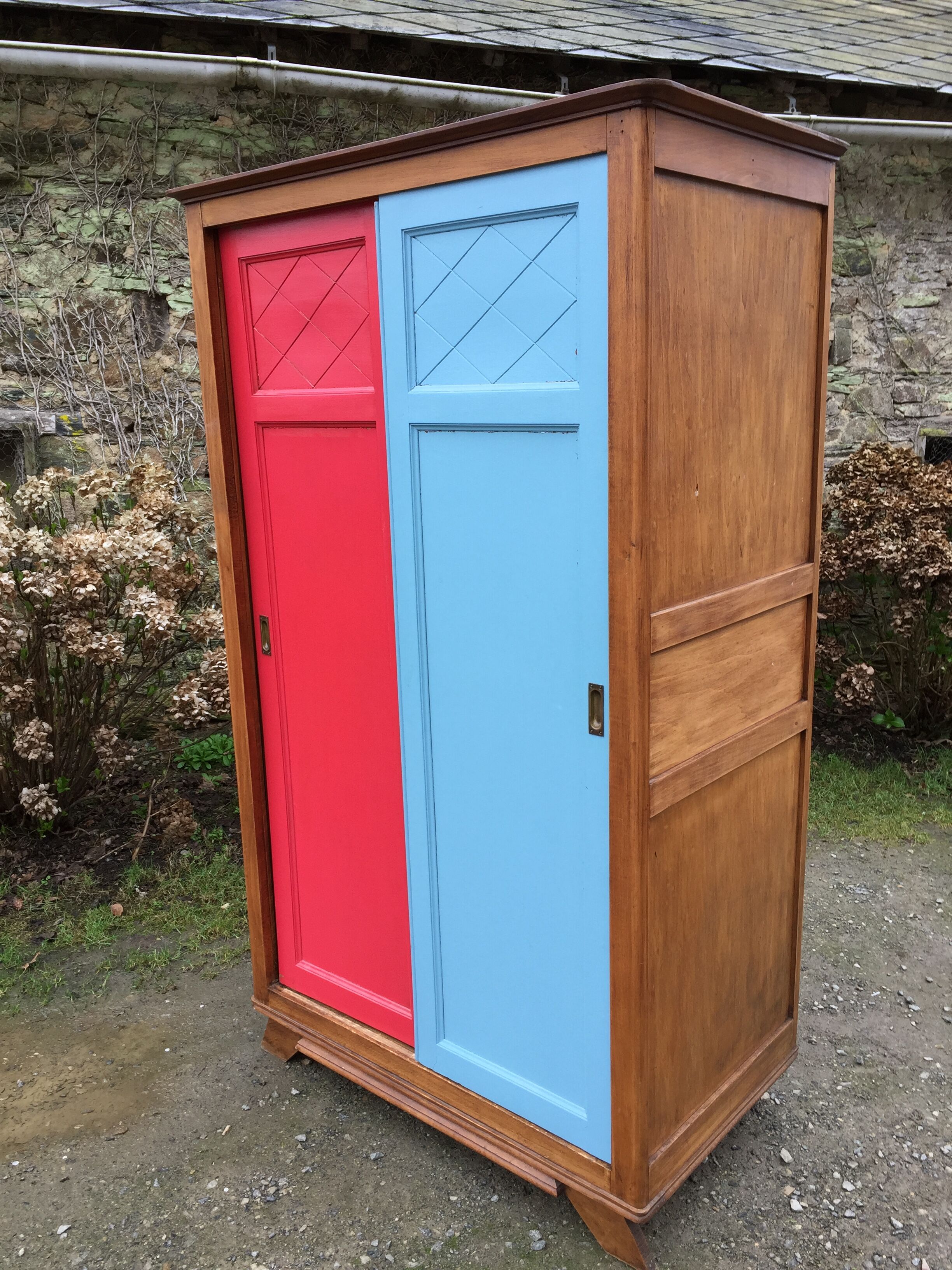 Vintage oak compass foot cabinet with 2 sliding doors painted red and blue