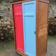 Vintage oak compass foot cabinet with 2 sliding doors painted red and blue