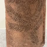 Large chamotte clay lamp in brutalist style, with a plant motif.