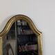 Antique gold mirror known as "gendarme's hat", patinated elegance 70 x 30 cm