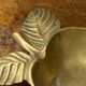 Apple-shaped brass ashtray