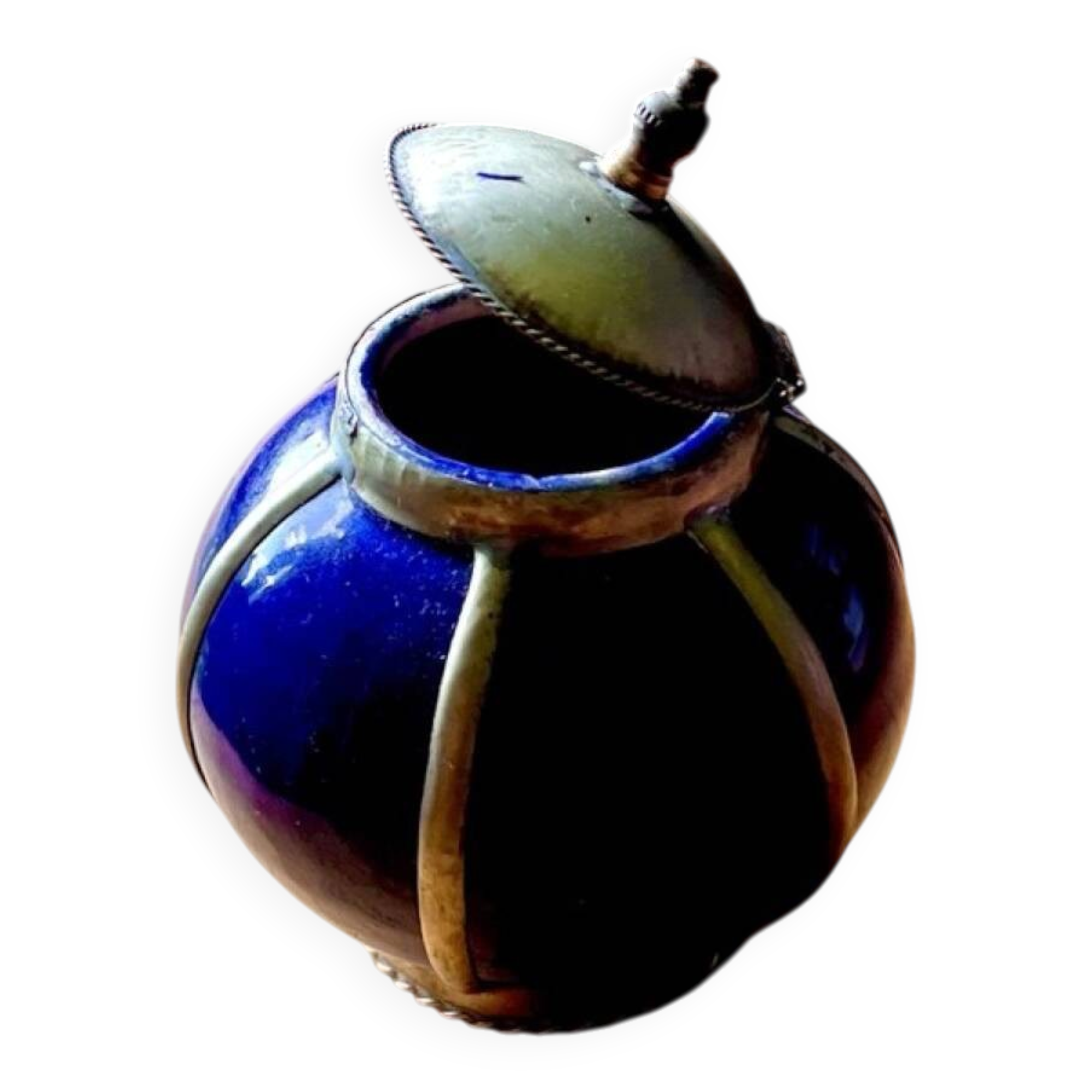 Small blue ceramic pot with metal frame and lid.