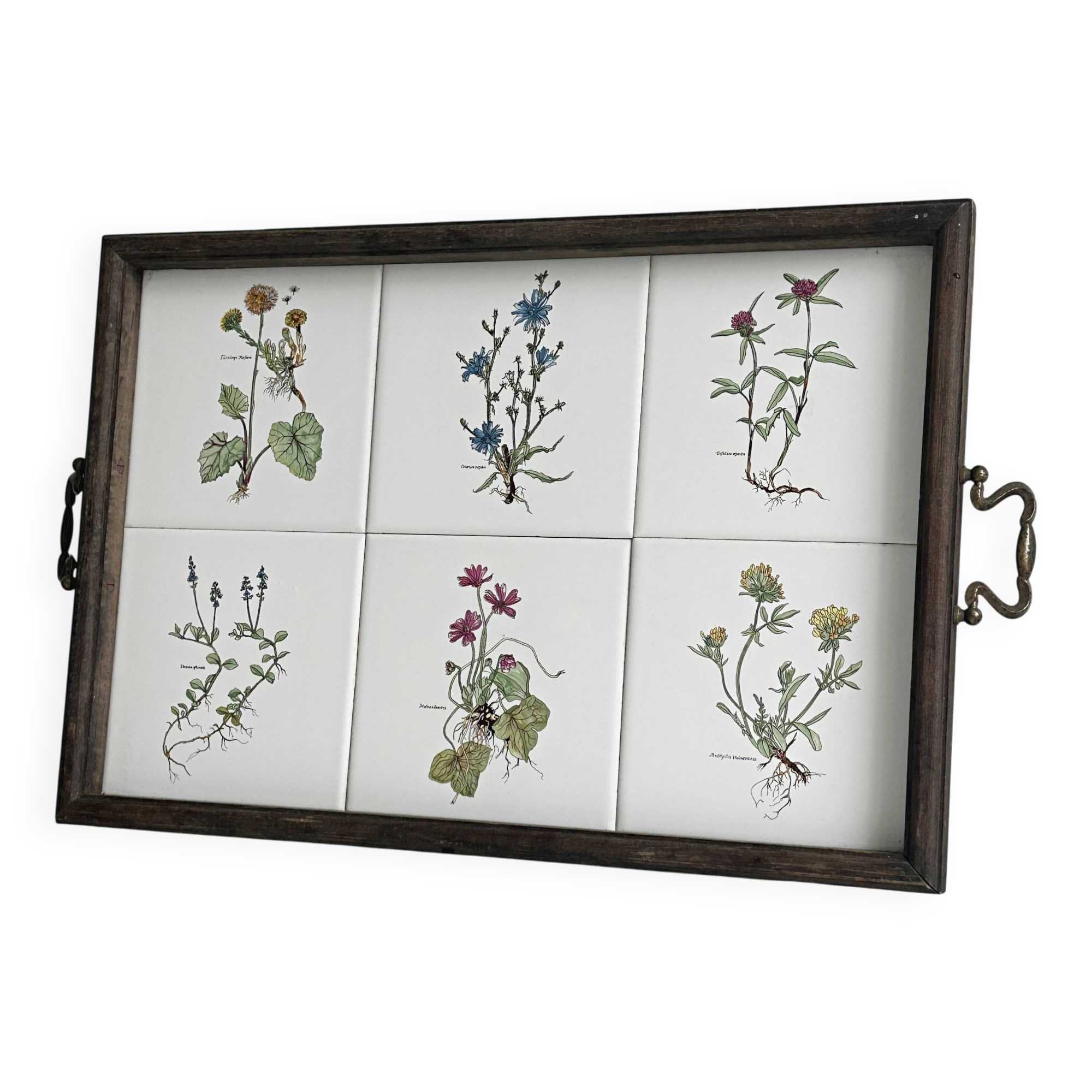 Old wooden plateau with floral tiles