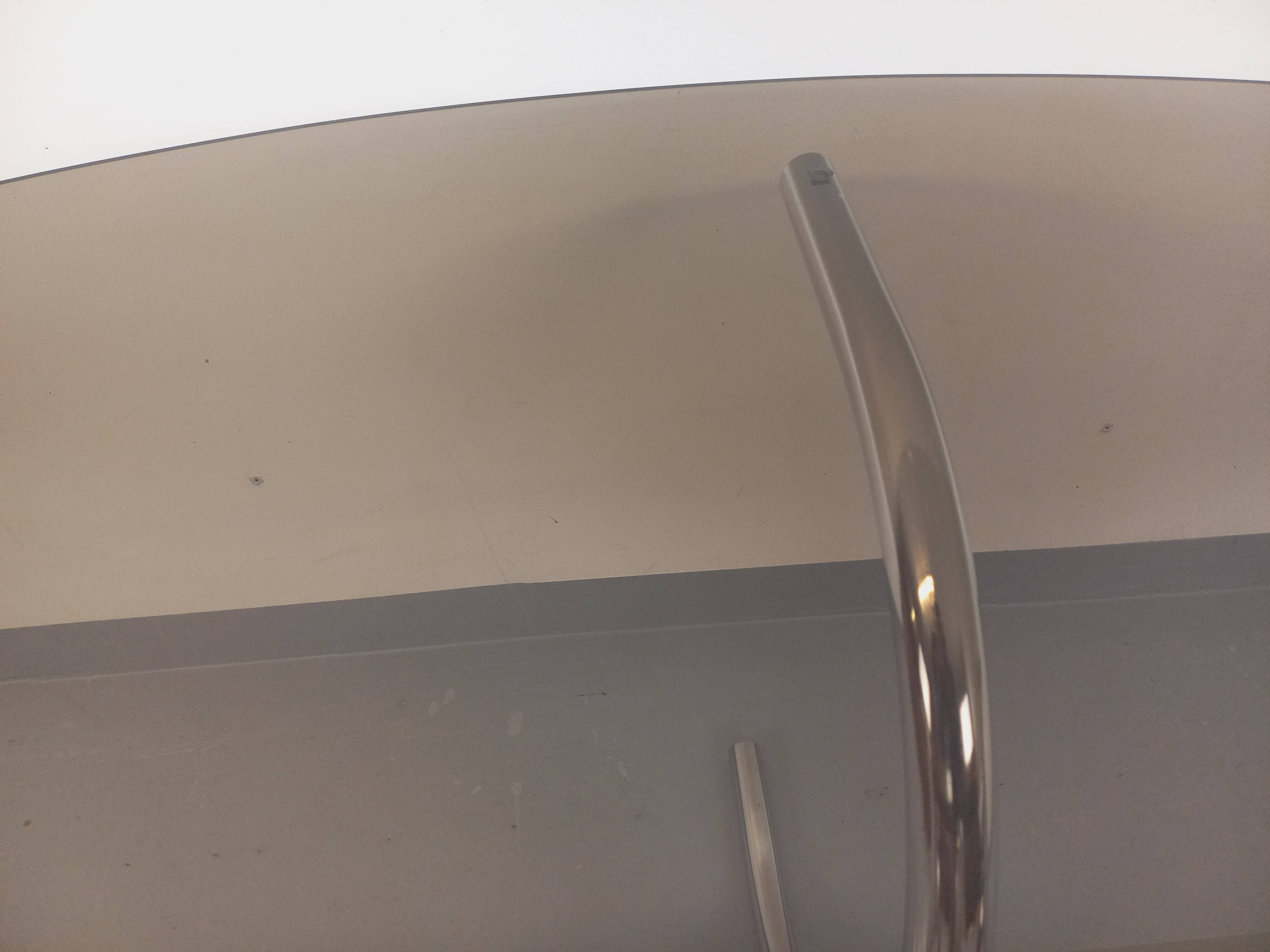 Vintage oval dining table in smoked glass and chrome metal