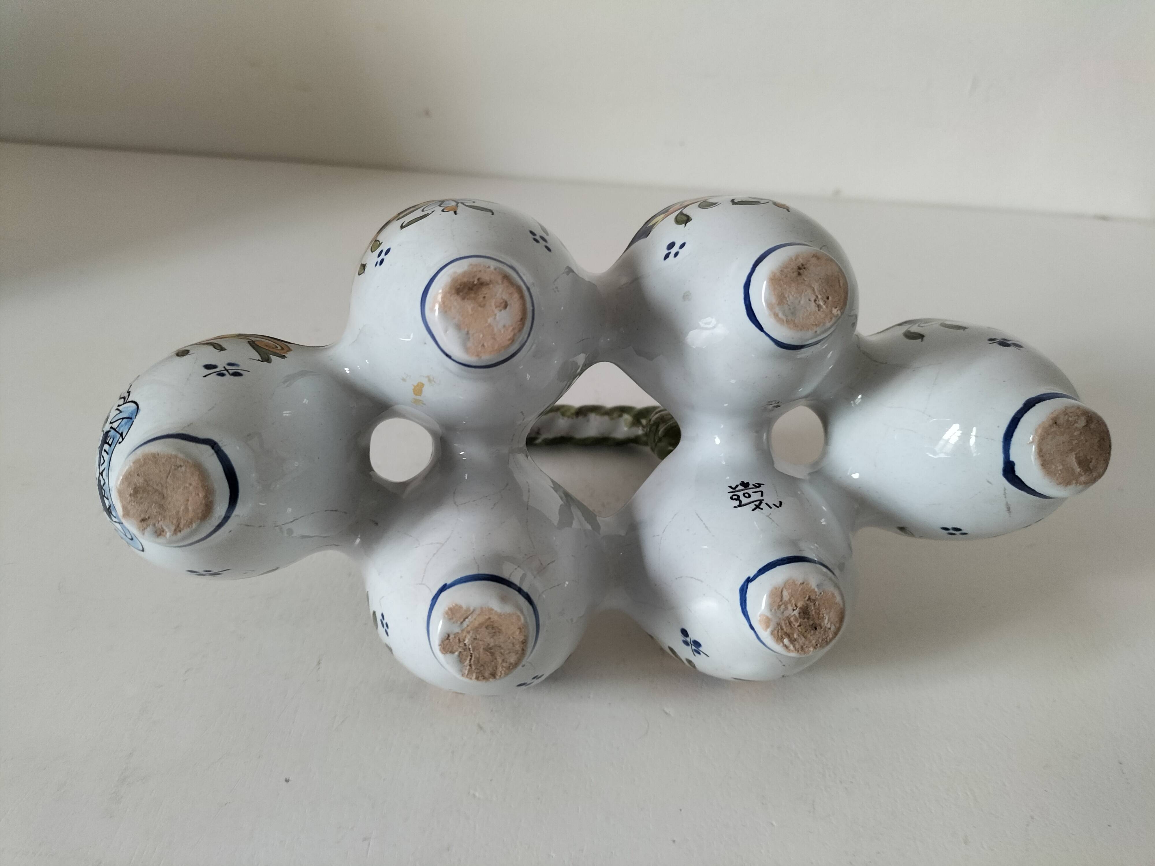 Antique egg holder by Jules Verlingue with polychrome floral decoration.