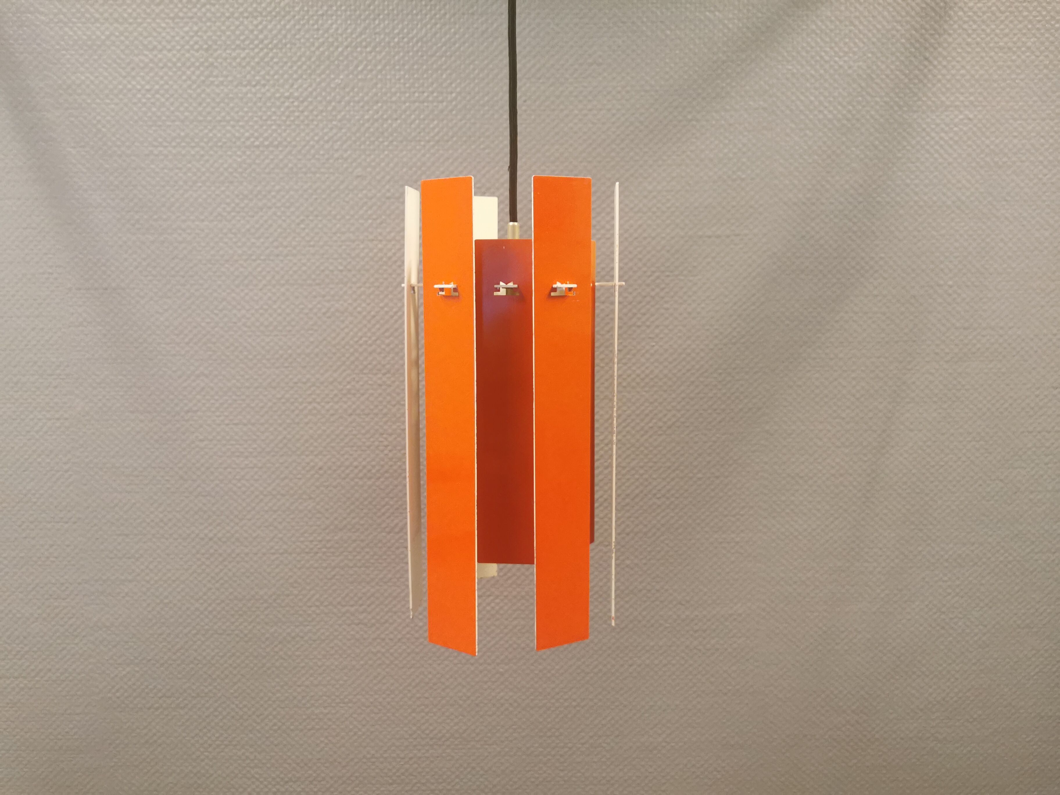 Danish hanging lamp model "Cocktail" consisting of 12 red/white aluminium slats