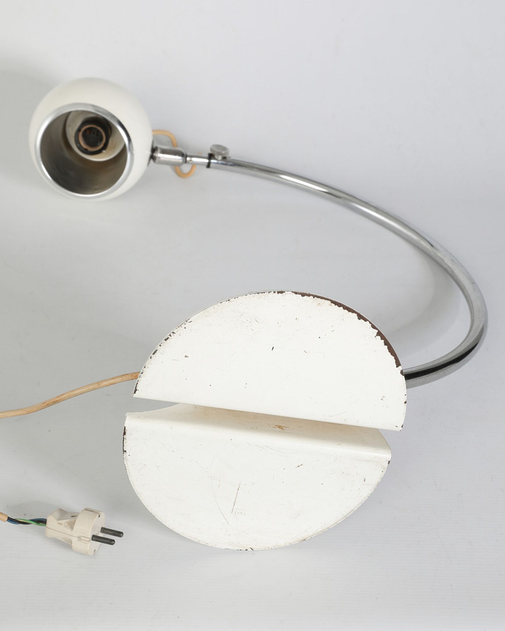 Lamp designed by luci cinisello - origin milan, italy - material: chromed metal painted white - height