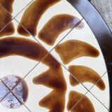 Round ceramic coffee table with “rooster” motif by Dan