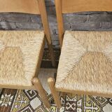 4 chaises en paille dans le style Charlotte Perriand 1970 vintage