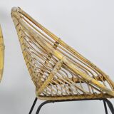 A pair of wicker chairs, 1970s