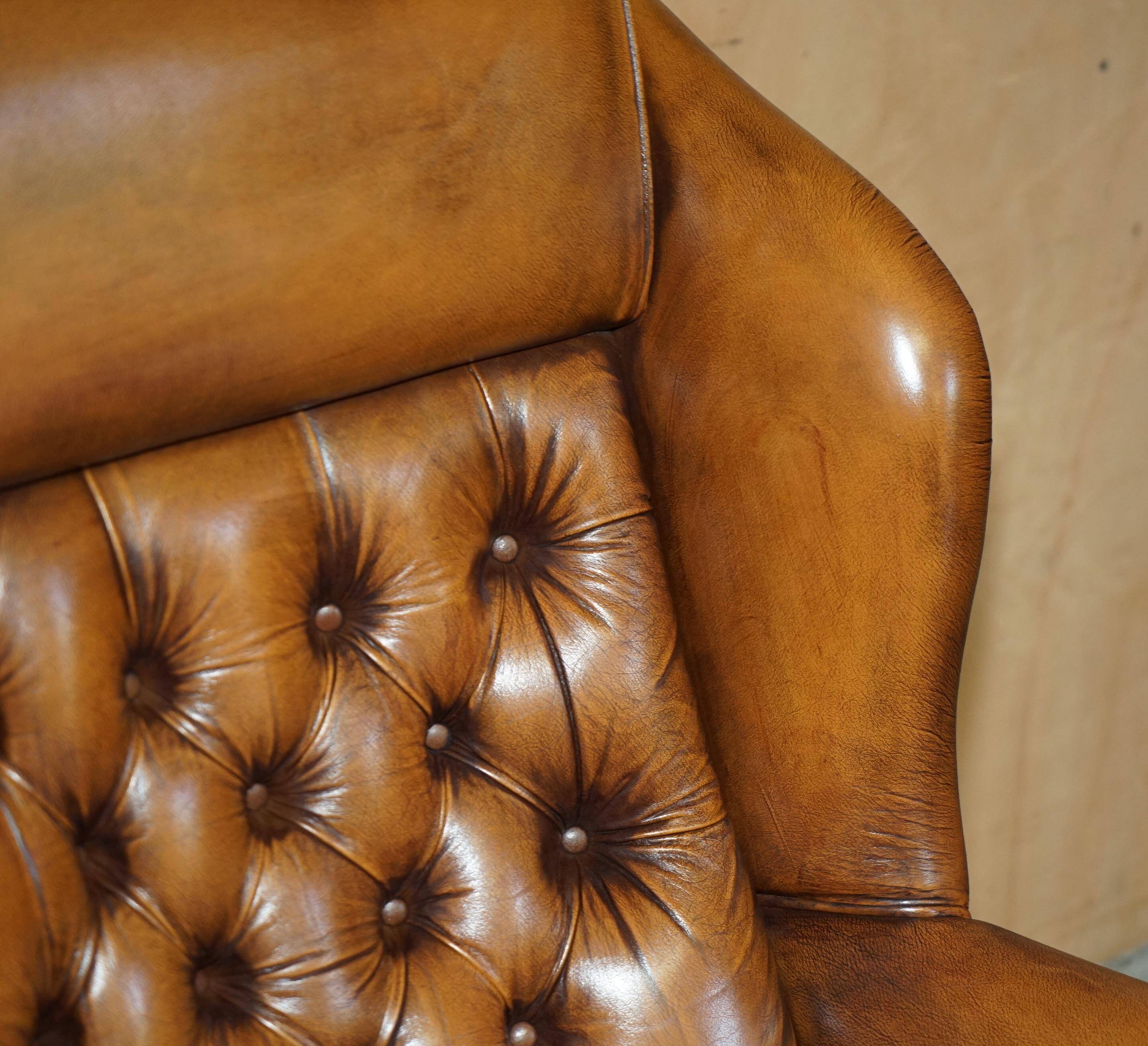 Captain's chair Chesterfield vintage leather with tufted wingback.