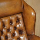 Captain's chair Chesterfield vintage leather with tufted wingback.