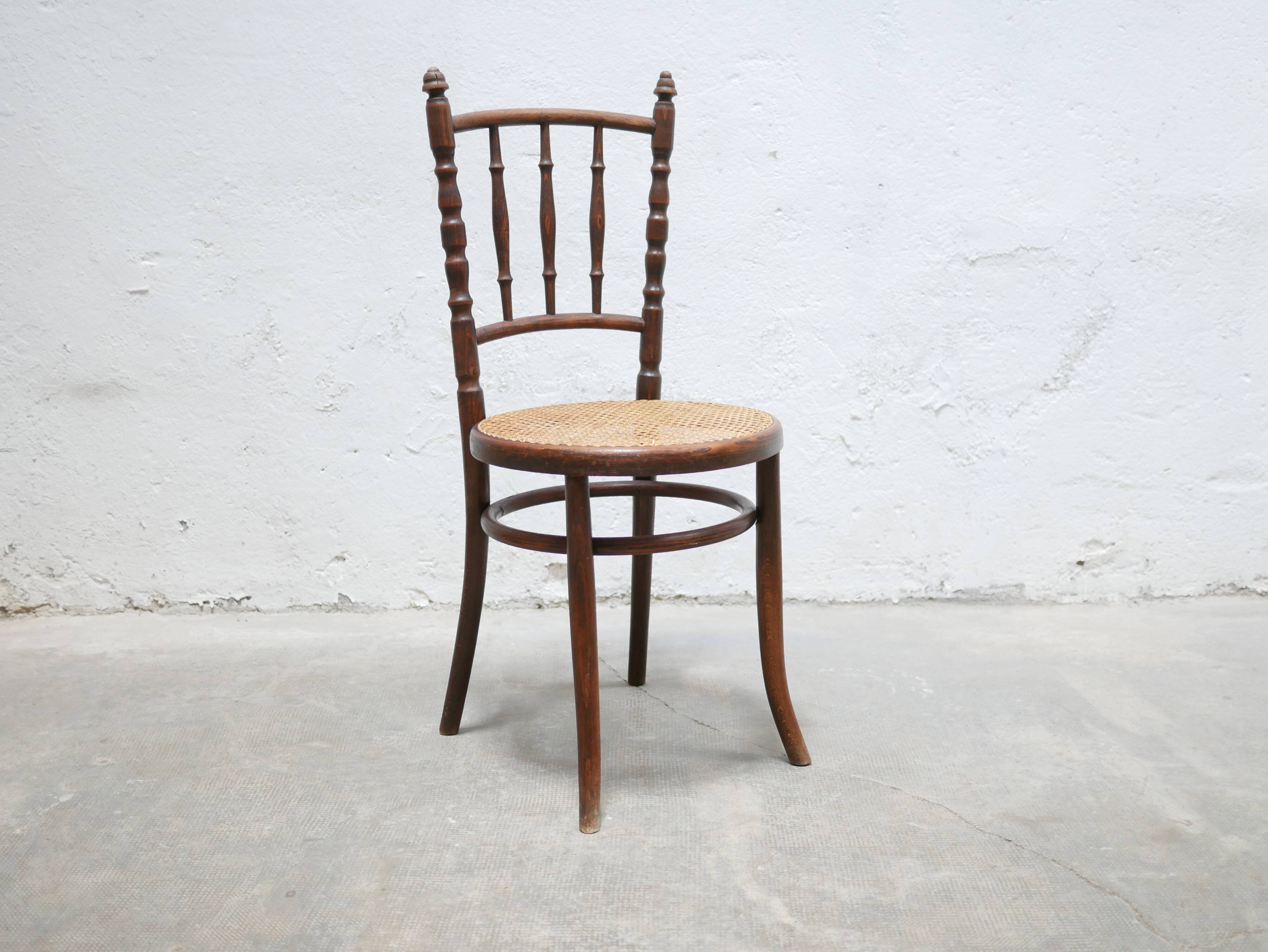 Old wooden cane bistro chair by Fischel editions