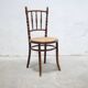 Old wooden cane bistro chair by Fischel editions