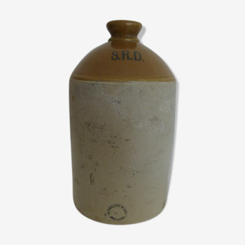 Old bottle in glazed stoneware