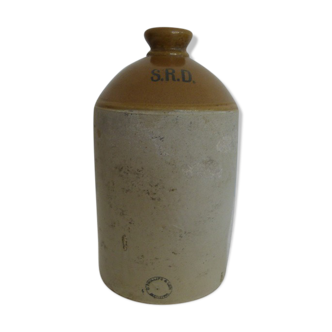 Old bottle in glazed stoneware